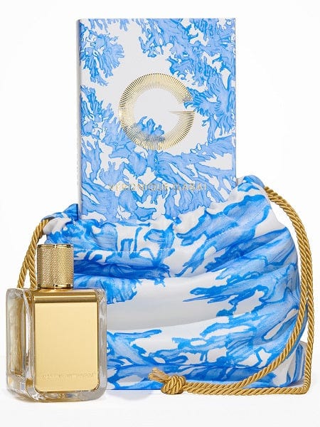 Veronique Gabai's collection with Ala Von Ausberg: an 85ml perfume bottle with a blue oceanic pouch and sleeve.