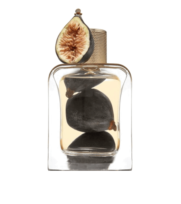 Délices des Bois — bottle with figs suspended in fragrance